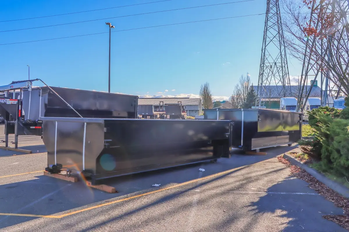 Roll-off dumpster ready for waste disposal at job site for Construction Dumpster Rental in Bay City